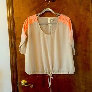 Neutral flowy short sleeve sheer top with hot coral lace detail